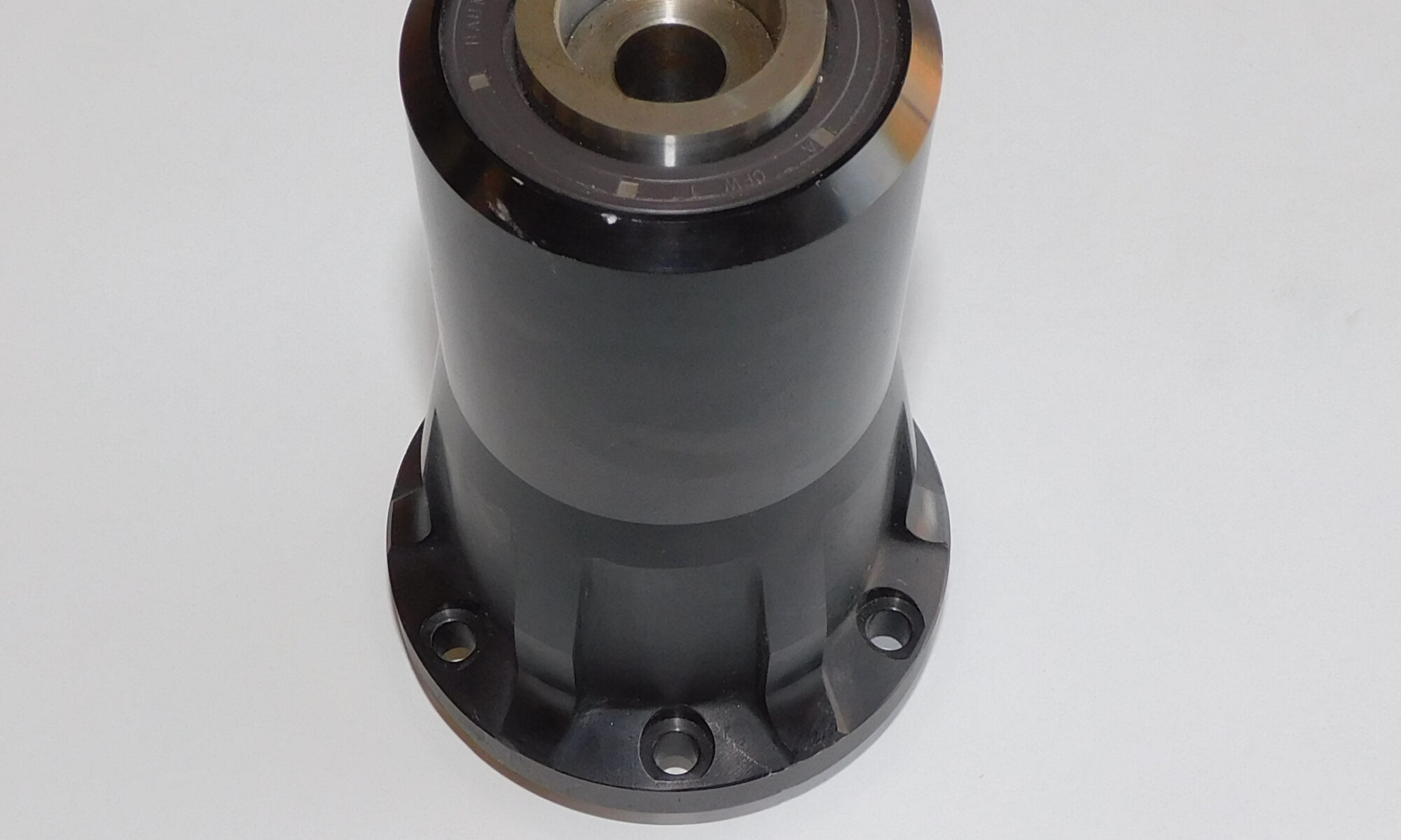 Black mechanical part with JB Performance logo.